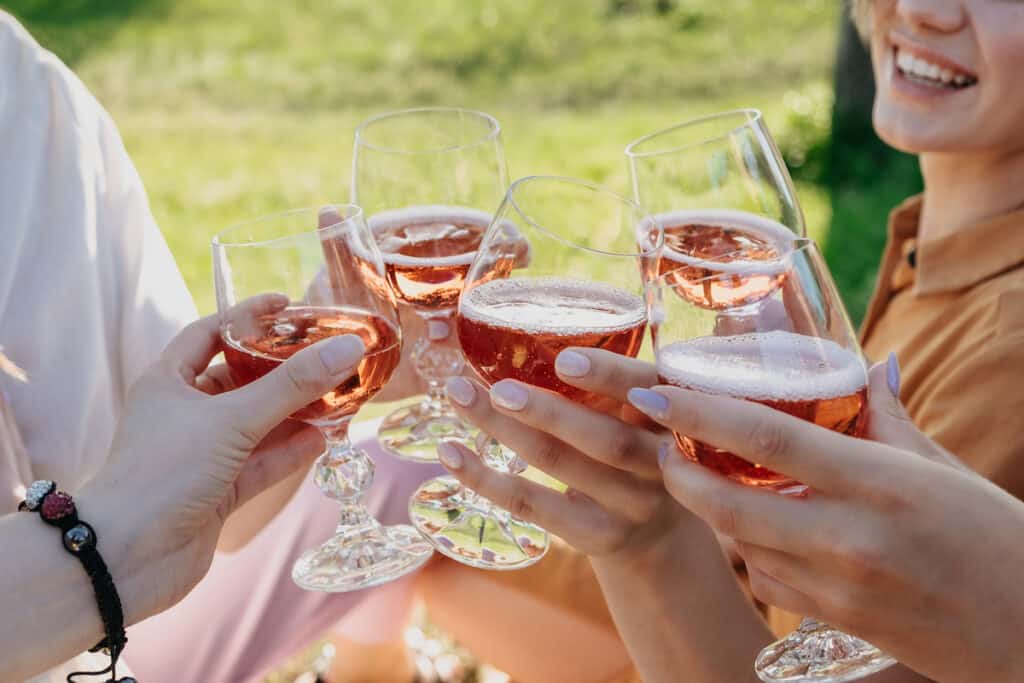 Youth drinking Italian aqua rosa wine